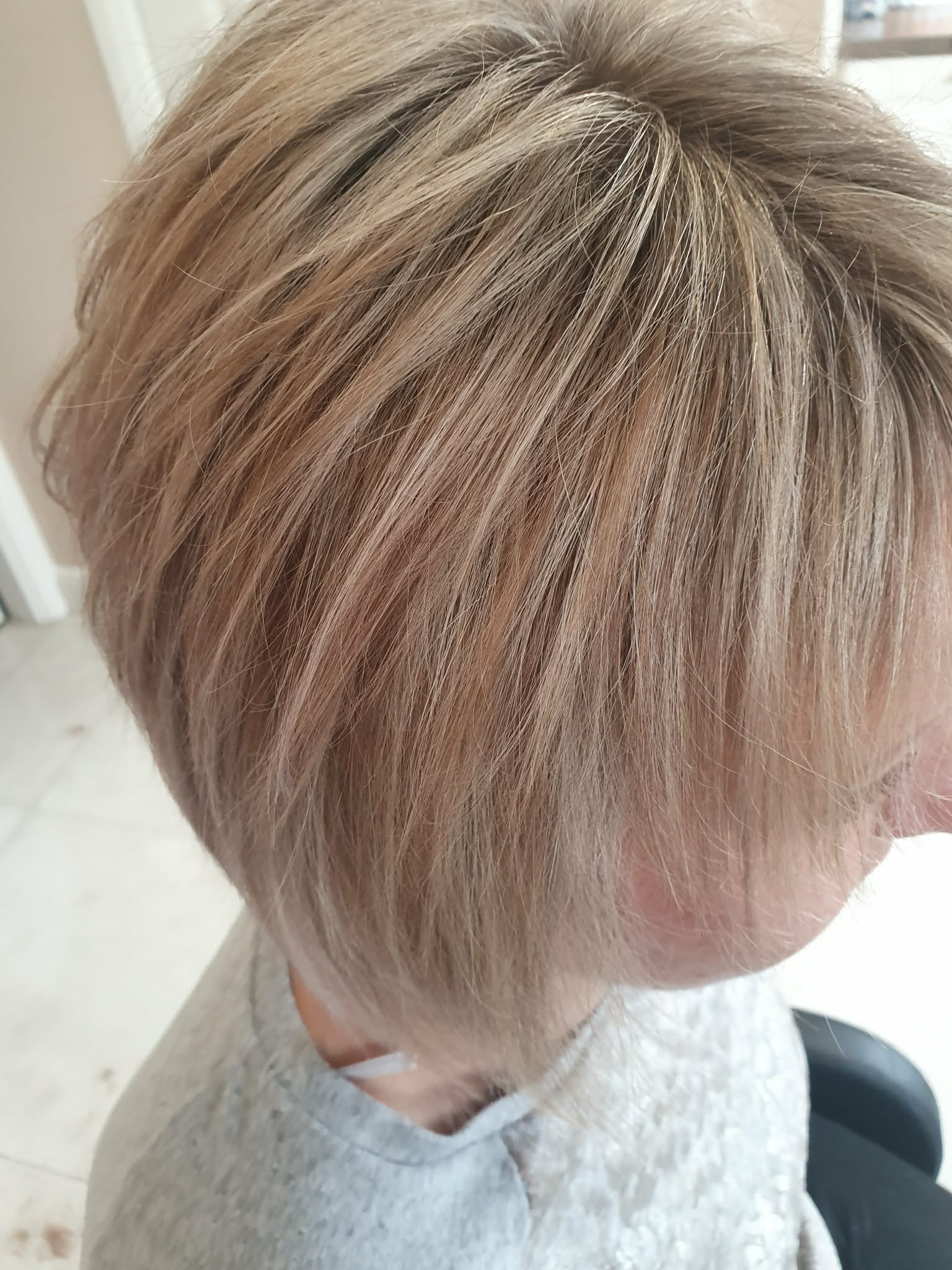 Before and after hair transformation at Aušra Beauty Studio